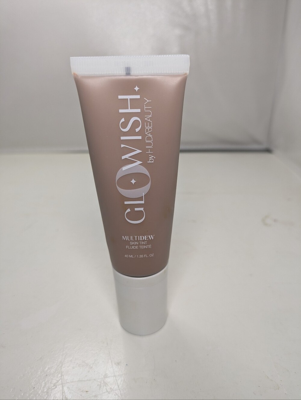HUDA BEAUTY GLOWISH Multi Dew Skin Tint 10 Deep Tan